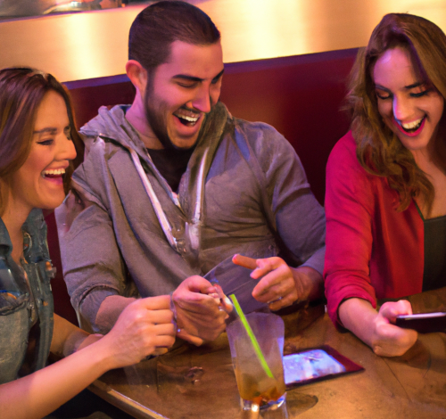 Three friends at a bar table, laughing, phones out mid-round.